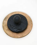 Universal Drain Stopper For Bathtub And Sink Your Go To Two Pack Black Plug in use on a white sink surface, made from durable silicone.