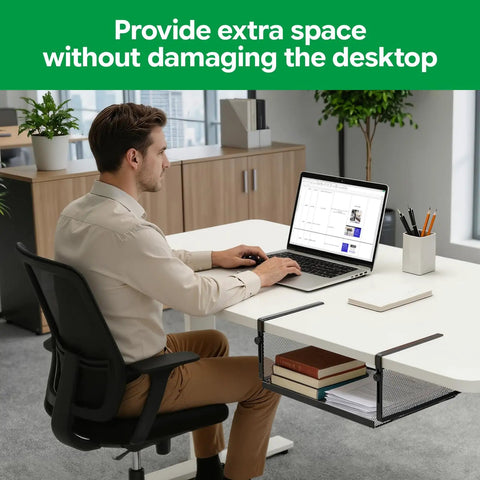 Man working at desk with Under Desk Organizer With Heavy Duty C Clamp, Adjustable Height Keyboard And Mouse Shelf, Space Saving Desk Storage Rack, Carbon Steel Black, visible.