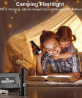 Mother and child using Beast Bright 10000 Lumen Flashlight Rechargeable 30W USB-C handheld LED light in a tent at night.