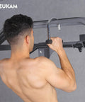 Man performing pull-up using Heavy Duty Metal Resistance Band Handles With Knurled Steel Grip Surface, showcasing industrial grade construction.