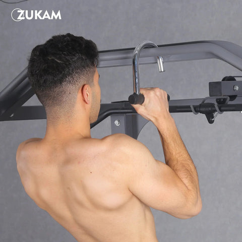 Man performing pull-up using Heavy Duty Metal Resistance Band Handles With Knurled Steel Grip Surface, showcasing industrial grade construction.