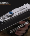 Hard Hitting Tactical Folding Pocket Knife For Men With 14C28N Stainless Steel Blade, All Metal Frame Lock shown closed in hand