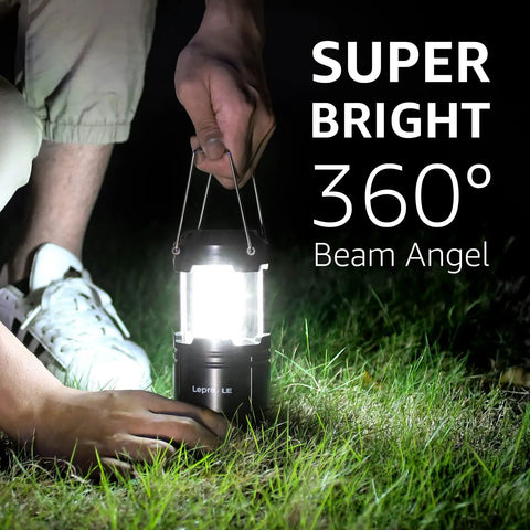 LED Lanterns Battery Powered For Camping And Outdoors held by person on grass at night, showing brightness and portability