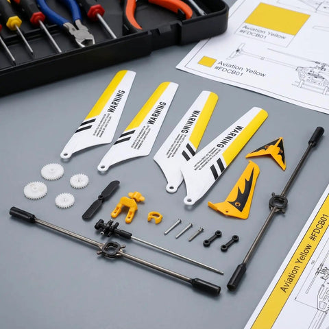 Ultimate Spare Parts Kit for S107 and S107G RC Helicopters in Yellow ABS Plastic and Alloy, components laid out on table