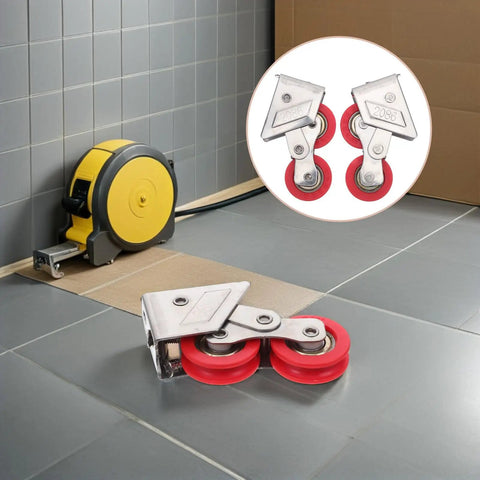 Heavy Duty Double Wheel Door And Window Rollers Super Smooth Stainless Steel Track Pulleys on gray tiles with yellow tape measure.