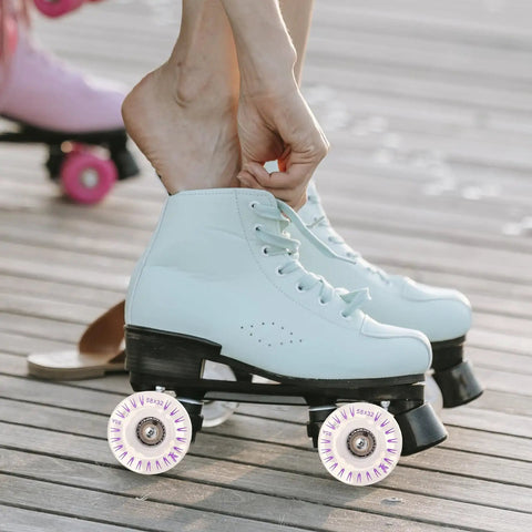 Person adjusting roller skates with Lit Up Roller Skate Wheels With Bearings 2 Pack LED Quad Lighted Replacement Wheels