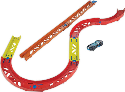 Track Builder Unlimited Playset Premium Curve Pack with 16 component parts and 1:64 scale vehicle on curved track layout