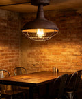 Straight Up Rustic Charm All Metal Barn Style Semi Flush Mount Ceiling Light Featuring Vintage Wire Cage Rust Finish in a cozy space