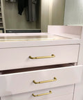 Boss Brushed Gold Cabinet Pulls With Fluted Texture 5 Inch Hole Center Drawer Handles on white dresser