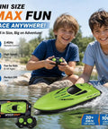 Boys playing with 2.4G Dual Motor RC Boat For Kids And Adults With High Speed Thrills Waterproof Boat For Lakes And Pools Easy Remote Control Multi Player Racing Durable Green Finish