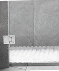 Brushed Stainless Glass Shower Door Hinge, 180 Degree Clamp For 4mm Frameless Shower Stall in modern bathroom setting.