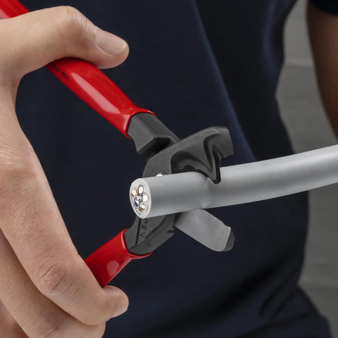 StepCut XL Cable Shears 9 Inch, High Leverage Joint, cutting cable with long handles in electrician's hand