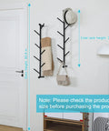 2 Pack Dope Wall Mounted Coat Rack With Rotating Hook Branches in entryway, holding hat, scarf, and bag next to furniture.