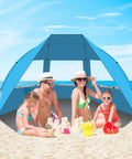 Family enjoying sandcastle under Portable Beach Tent For 3 To 7 People, UPF 50 Plus Sun Shelter, on a sunny beach day
