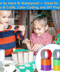 Children using 6 Pack Rainbow Colored Duct Tape, 15 Yards Each Roll, 2 Inches Wide, Heavy Duty Tear By Hand, Waterproof And Residue Free