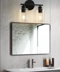 Snag This Top Shelf Matte Black Two Light Bathroom Vanity Fixture With Clear Glass Shades Solid Rust Resistant Construction Sconce, modern design above mirror.