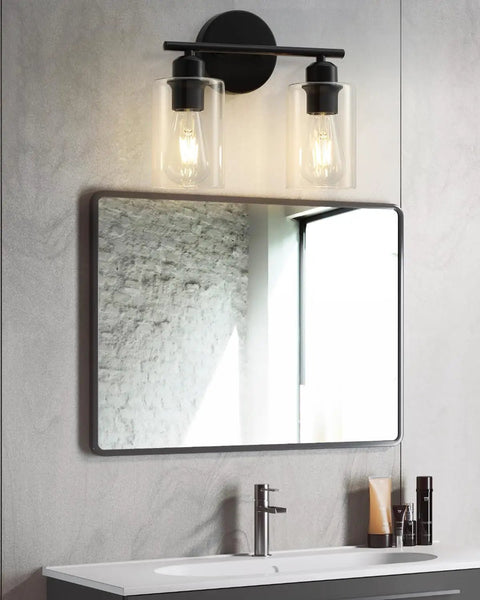 Snag This Top Shelf Matte Black Two Light Bathroom Vanity Fixture With Clear Glass Shades Solid Rust Resistant Construction Sconce, modern design above mirror.