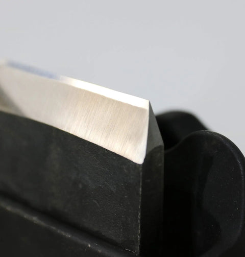 Close-up of blade in Honing Guide Sharpening Jig For Chisels And Planes Blades Japanese Woodworking Tool Guide With Pro Grade Angle Control