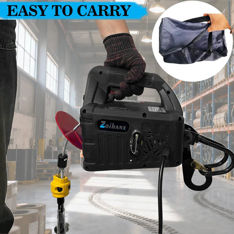 Person holding All In One Beefed Up Electric Hoist Winch 1100 Lb Portable with double hooks in factory setting