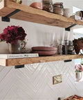 Legit Heavy Duty Floating Shelf Brackets 10 Pack Thick Invisible L Bracket Wall Mounts holding rustic wooden shelves with decor.