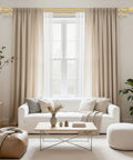 Gold Extra Long Dual Curtain Rod Set 36 To 153 Inches Adjustable Heavy Duty Vintage Spliced 1 Inch Window Treatment Rods With Crystal Foil Finials And Sleek End Caps For Wide Windows installed above beige curtains in a bright living room with a white sofa and plants.