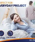 Woman relaxing on sofa covered with 6 Pack 12x9 Ft Extra Large Plastic Drop Cloth For Painting, man painting wall.
