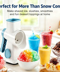 Manual Ice Shaver With 16 Stainless Steel Blades creating colorful shaved ice and drinks, white kitchen gadget with suction base.