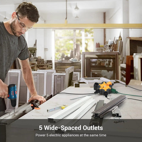 Industrial 5 Outlet Power Hub With 15 Ft Heavy Duty Extension Cord For Garage And Workshop in a workshop setting.