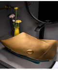 Top Shelf Porcelain Vessel Sink For Modern Bathroom Vanity Above Counter Ceramic Lavatory Bowl with gold finish and rounded edges.
