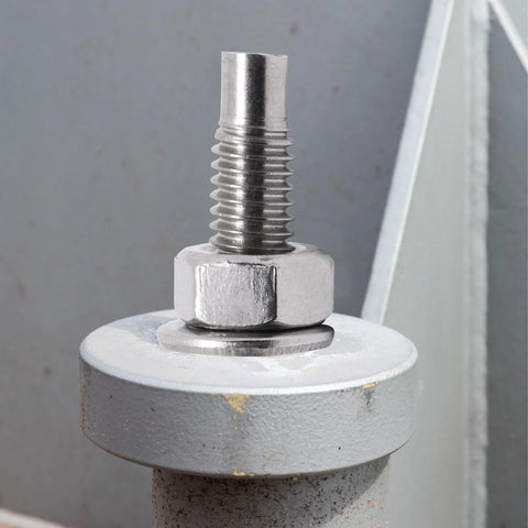Close-up of One Half Inch By Three And One Half Inch Stainless Steel Wedge Concrete Anchors Heavy Duty Bolts for cement installation