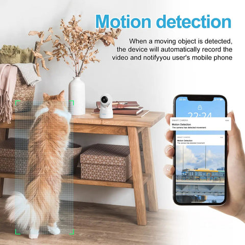 Indoor Security Camera With 360 Degree View And Auto Tracking For Home Or Pet Monitoring on table with cat and phone
