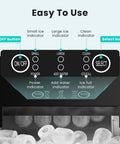 OLIXIS black countertop ice maker with handle; front control panel with On/Off and Select buttons.