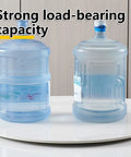 24 Inch Round Marble Lazy Susan Turntable With Tempered Glass Cover Easy To Clean And Spin in use with water bottles displaying load capacity