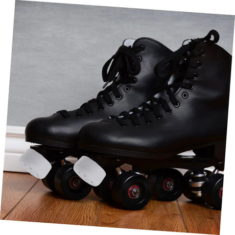 Rubber Brake Block Stopper Kit For Roller Skates And Quad Skates Adjustable Toe Stops on black skates on wooden floor