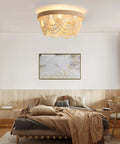 Stylish Boho Fandelier Ceiling Fan With Built In Light And Wireless Remote Six Speeds Low Profile Flush Mount Wood Beaded Detail in a modern bedroom.