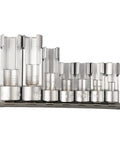 Diesel Injector And Fuel Line Socket Set With Slotted Open End Design For Hard To Reach Nuts Three Eighths Inch Drive And One Half Inch Drive Ten To Nineteen Millimeter Range Seven Piece Silver Metal Tool Kit For The Garage displayed in a stand