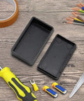 Built Tough Abs Plastic Junction Box For Circuit Boards Dustproof Electronics Project Enclosure Housing Black 3.54 By 2.56 By 1.42 Inches Two Pack displayed with tools.