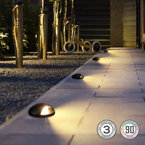 6W Well Lights Landscape LED Kit Pack Of 6 No Glare Outdoor In Ground Lights illuminating garden pathway at night, 320 Lumens