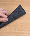 Hand holding Assorted Sandpaper Sheets 400 600 800 1000 1200 1500 Two Sheets Each Dry Wet Waterproof 9 x 3.6 Inch For Wood