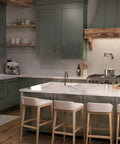 Modern kitchen with hansgrohe Talis N Pull Down Kitchen Faucet, 1-Handle brushed black chrome faucet above white farmhouse sink.
