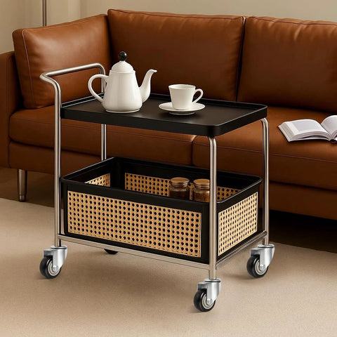 Rolling cart with black top, chrome frame, and woven basket shelf on four swivel casters.