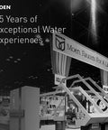 Moen exhibit booth showcasing 85 years of exceptional water experiences at a trade show.