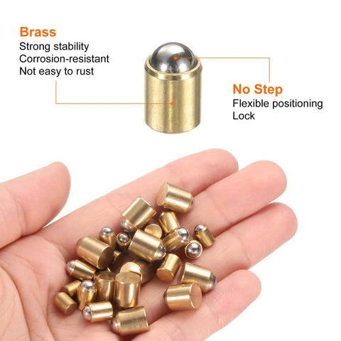 Top Tier Brass Ball Point Spring Plungers 30 Piece Assorted Kit Featuring Legit Tough No Step positioning beads in hand.