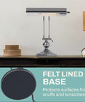 Adjustable Leaning Piano Desk Lamp In Satin Nickel Finish With Classic Retro Banker Style, round base, metal shade on desk