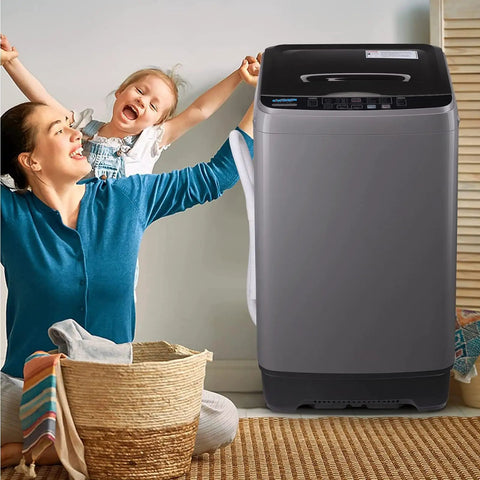 Compact Full Automatic Washing Machine In Sleek Grey with user and child, featuring a laundry basket and relaxed setting.