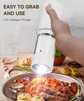 Upgraded Electric Salt And Pepper Grinder Set With Dual Charging Base, Rechargeable Operation Eliminates Frequent Battery Replacement For Eco Friendly Convenience In Your Home Kitchen Setup Today, hand-held, LED light, with salt inside.