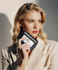 Woman holding RFID Blocking Leather Card Holder With Detachable Keychain Slim Wallet For Men And Women Everyday Carry Genuine Leather Pro Black External ID Window Keeps Cards Safe And Organized