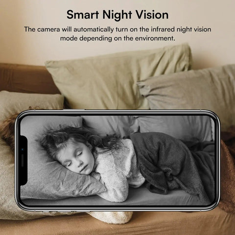 Phone displaying Wireless Light Bulb Security Camera With Pan Tilt 360 Degree View 2.4GHz WiFi Indoor Outdoor Night Vision And Two Way Audio Easy E27 Bulb Base Setup 1080P HD Surveillance, showing night vision of a child sleeping.