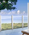 Hella Durable 304 Stainless Steel Corner Post For Glass Railing With Rock Solid Rectangle Base Built Tough For Commercial Deck Balcony Hotel Handrail Support At 37 Point Four Inch Height in outdoor setting with glass panels.