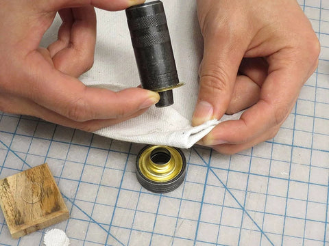 Professional Grommet Kit For Three Eighths To One Half Inch Brass Grommets For Tarp Repair And Canvas Reinforcement in use
